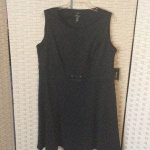 Style & Co. black sleeveless dress with silver buckle detail at waist.